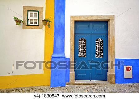 Blue Wood Ornate Door against a Whitewashed Plaster Wall View Large Photo Image Stock Photo - Blue Wood Ornate Door against a Whitewashed Plaster Wall. Fotosearch