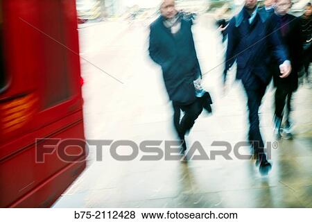 Blur urban image of unrecognizable people walking on the street in London, England, UK, Europe. View Large Photo Image Stock Photo - Blur urban image of unrecognizable people walking on the street in London, England, UK, Europe.. Fotosearch