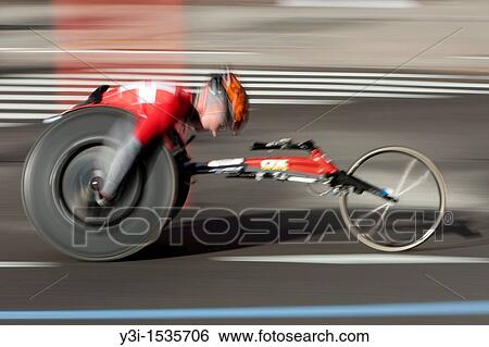 Blurred abstraction of wheelchair division competitor during the 2010 New York City Marathon in New York City, New York, USA View Large Photo Image Stock Photograph - Blurred abstraction of wheelchair division competitor during the 2010 New York City Marathon in New York City, New York, USA. Fotosearch