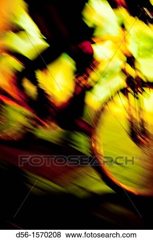 Blurred bike at night View Large Photo Image Stock Photo - Blurred bike at night. Fotosearch