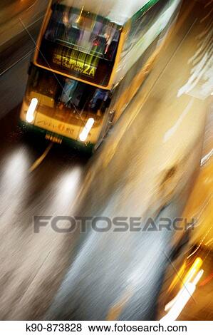 Blurred city bus moving in high speed on the street in Wanchai (Wan Chai), Hong Kong, China, Southeast Asia View Large Photo Image Stock Photo - Blurred city bus moving in high speed on the street in Wanchai (Wan Chai), Hong Kong, China, Southeast Asia. Fotosearch
