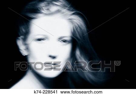blurred image of young woman View Large Photo Image Stock Image - blurred image of young woman. Fotosearch