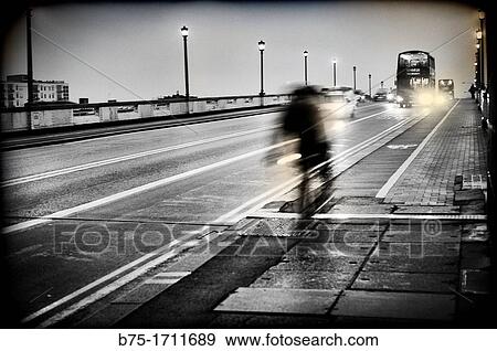 Blurred motion, Double-decker bus and bicycle in movement, Clapham junction, England, London, UK View Large Photo Image Stock Photo - Blurred motion, Double-decker bus and bicycle in movement, Clapham junction, England, London, UK. Fotosearch