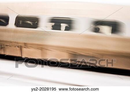 Blurred motion of train with passengers at winter in Stockholm, Sweden. View Large Photo Image Stock Photography - Blurred motion of train with passengers at winter in Stockholm, Sweden.. Fotosearch