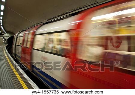 Blurred underground train leaving the station, London, United Kingdom View Large Photo Image Stock Photography - Blurred underground train leaving the station, London, United Kingdom. Fotosearch