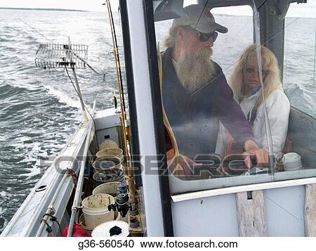 Stock Image - Bo Christenson and Donna J. Cote, R. I. Quahoggers, USA. Fotosearch
