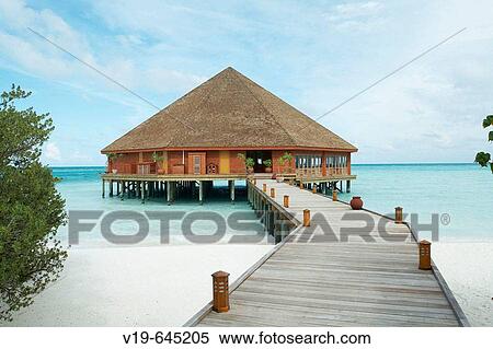 Boardwalk guiding to resort in Maldives Island, Indian Ocean. View Large Photo Image Stock Photography - Boardwalk guiding to resort in Maldives Island, Indian Ocean.. Fotosearch