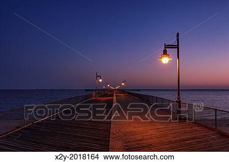 Boardwalk pier at night. Cape Helopen State Park, Delaware. View Large Photo Image Picture - Boardwalk pier at night. Cape Helopen State Park, Delaware.. Fotosearch