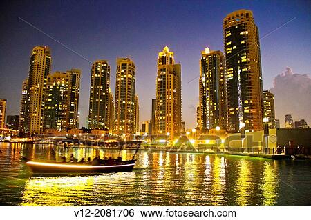 Boat atThe Dubai Fountain, Dubai, United Arab Emirates View Large Photo Image Stock Photograph - Boat atThe Dubai Fountain, Dubai, United Arab Emirates. Fotosearch