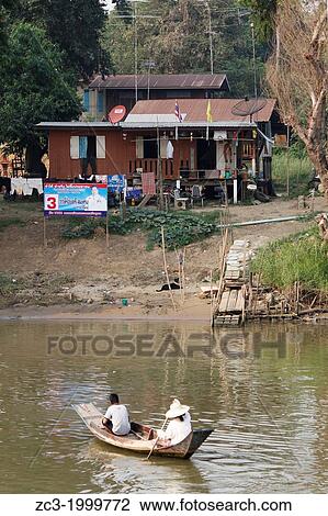 Boat, dock, river and shack in the city of Phra Nakhon Si Ayutthaya, Thailand. View Large Photo Image Stock Image - Boat, dock, river and shack in the city of Phra Nakhon Si Ayutthaya, Thailand.. Fotosearch