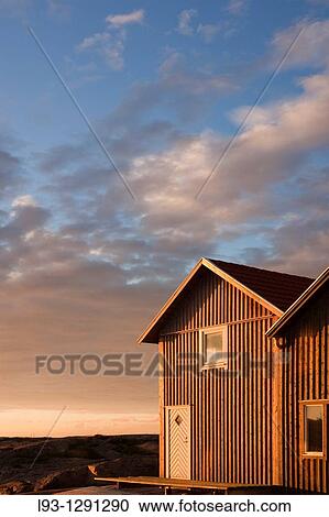 Boat house at sunrise, Bohusln, Sweden View Large Photo Image Stock Image - Boat house at sunrise, Bohusln, Sweden. Fotosearch