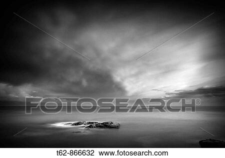 Boat on the horizon Sunset in winter on the Costa Brava, Catalonia, Spain View Large Photo Image Stock Image - Boat on the horizon Sunset in winter on the Costa Brava, Catalonia, Spain. Fotosearch