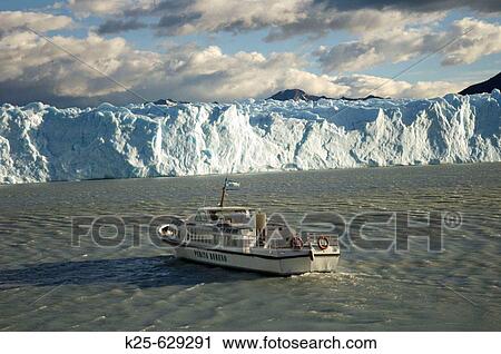 Stock Image - Boat. Perito Moreno glacier. Los Glaciares National Park. Santa Cruz province. Patagonia. Argentina.. Fotosearch