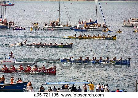 Boat race at La Concha, San Sebastian. Guipuzcoa, Basque Country, Spain View Large Photo Image Stock Photography - Boat race at La Concha, San Sebastian. Guipuzcoa, Basque Country, Spain. Fotosearch