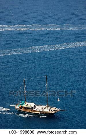 Stock Photo - Boat sailing in the Mediterranean Sea.. Fotosearch