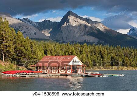 Stock Photograph - Boathouse at Maligne Lake in the Canadian Rocky Mountains, Jasper National Park, Alberta, Canada. Fotosearch