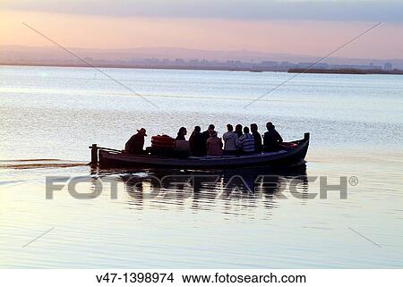 Boating, Natural Park L? Albufera, Dehesa del Saler, marsh, El Saler, Valencia, Spain View Large Photo Image Picture - Boating, Natural Park L? Albufera, Dehesa del Saler, marsh, El Saler, Valencia, Spain. Fotosearch
