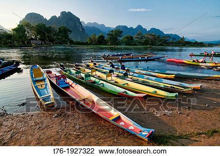 boats along the Nam Song River in Vang Vieng, Laos View Large Photo Image Stock Image - boats along the Nam Song River in Vang Vieng, Laos. Fotosearch