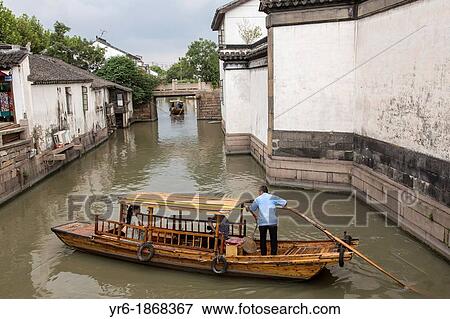 Boats and gondolas along a canal at Pingjiang Road in Suzhou, China View Large Photo Image Stock Photo - Boats and gondolas along a canal at Pingjiang Road in Suzhou, China. Fotosearch