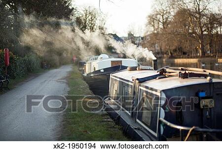 Boats moored at Thames River in Oxford, UK. View Large Photo Image Picture - Boats moored at Thames River in Oxford, UK.. Fotosearch