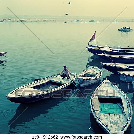 Boats on the river Ganges Varanasi, Benares, Uttar Pradesh, India View Large Photo Image Stock Image - Boats on the river Ganges Varanasi, Benares, Uttar Pradesh, India. Fotosearch