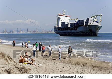 Boats stranded on the beach of Saler, Valencia View Large Photo Image Stock Image - Boats stranded on the beach of Saler, Valencia. Fotosearch