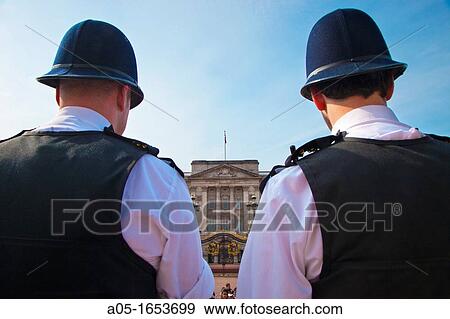 Bobbies at Buckingham Palace, Westminster, London, England, United Kingdom. View Large Photo Image Stock Photo - Bobbies at Buckingham Palace, Westminster, London, England, United Kingdom.. Fotosearch