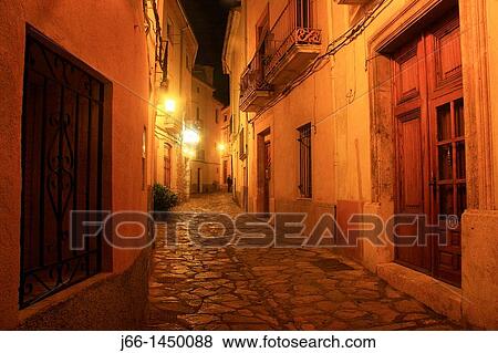 Bocairent street at dusk, Valencia province, Comunidad Valenciana, Spain View Large Photo Image Stock Photo - Bocairent street at dusk, Valencia province, Comunidad Valenciana, Spain. Fotosearch