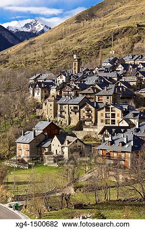 Stock Image - Boi village with the steeple of the Church of Santa Maria and slate roofs typical - Ta? ll - Vall de Boi - Pyrenees - Lleida Province - Catalonia - Catalonia - Spain. Fotosearch