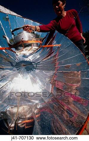 Boiling water on solar disk, an alternative energy supply for rural villages, Leh, Ladakh View Large Photo Image Stock Image - Boiling water on solar disk, an alternative energy supply for rural villages, Leh, Ladakh. Fotosearch