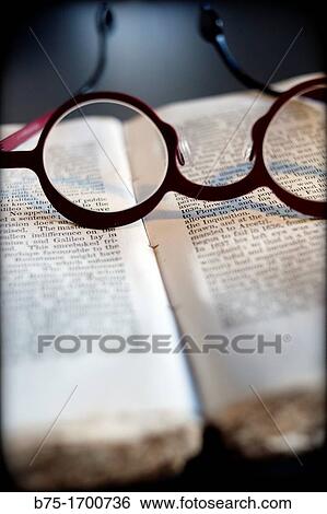 Book with glasses View Large Photo Image Stock Photograph - Book with glasses. Fotosearch