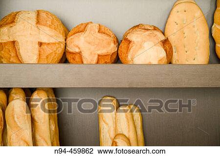 Bookshelf speaker with loaves of different types and sizes in the oven baking Canizares of Valencia, Valencia, Spain. View Large Photo Image Stock Image - Bookshelf speaker with loaves of different types and sizes in the oven baking Canizares of Valencia, Valencia, Spain.. Fotosearch