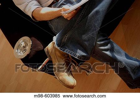 Stock Photography - Boot on man. Fotosearch