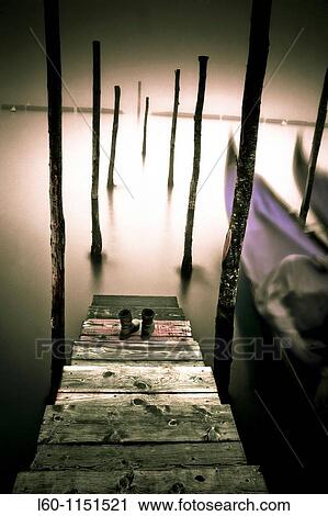 Boots in the pier View Large Photo Image Stock Image - Boots in the pier. Fotosearch