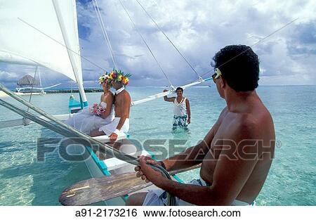 . Bora-Bora in the Leeward islands. Society archipelago. French Polynesia. wedding celebrated on the lagoon. View Large Photo Image Stock Photograph - . Bora-Bora in the Leeward islands. Society archipelago. French Polynesia. wedding celebrated on the lagoon.. Fotosearch