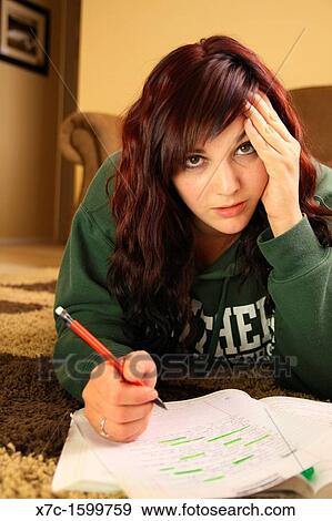 Stock Photo - bored and frustrated female college student. Fotosearch