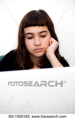 Bored girl studying View Large Photo Image Stock Image - Bored girl studying. Fotosearch