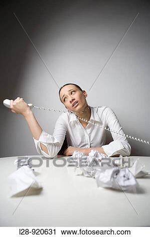 Bored Worker Office Woman playing with phone View Large Photo Image Stock Image - Bored Worker Office Woman playing with phone. Fotosearch