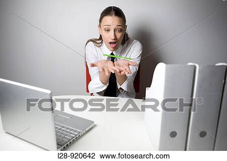 Bored Worker Office Woman playing with pencil View Large Photo Image Stock Image - Bored Worker Office Woman playing with pencil. Fotosearch