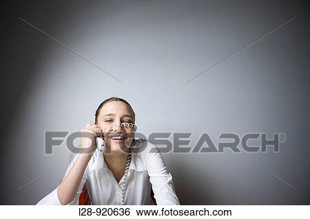 Bored Worker Office Woman playing with phone View Large Photo Image Stock Photograph - Bored Worker Office Woman playing with phone. Fotosearch