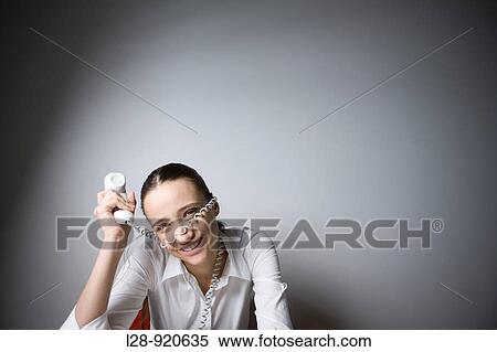 Bored Worker Office Woman playing with phone View Large Photo Image Stock Photography - Bored Worker Office Woman playing with phone. Fotosearch