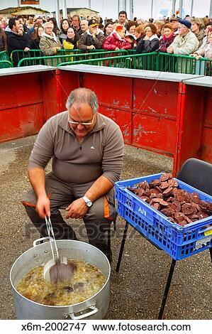 Stock Photo - Boronos con repinaldas tasting. Orujo fair. Potes, Comarca de Li? bana, Cantabria, Spain.. Fotosearch