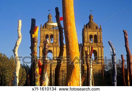 `Bosque Encantado?,enchanted Forest, by Agust? n Ibarrola Goicoechea, in background Sant? sima Trinidad church, Salamanca, Spain View Large Photo Image Picture - `Bosque Encantado?,enchanted Forest, by Agust? n Ibarrola Goicoechea, in background Sant? sima Trinidad church, Salamanca, Spain. Fotosearch
