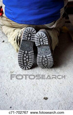 Bottom of construction workers boots View Large Photo Image Stock Photo - Bottom of construction workers boots. Fotosearch
