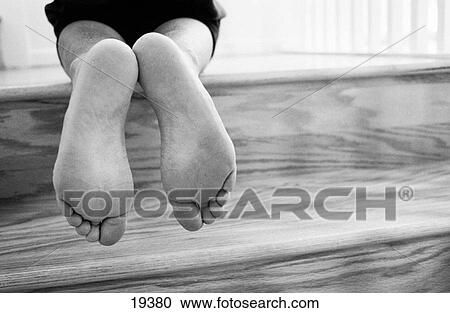 Stock Image - Bottom of woman's feet. Fotosearch
