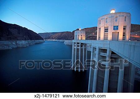 Stock Image - Boulder City, Nevada - Lake Mead behind the Hoover Dam The white? bathtub ring? around the reservoir indicates declining water levels. Fotosearch