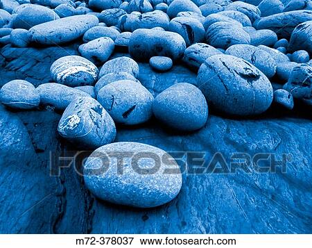 Stock Photo - Boulders on the beach. Costa Vicentina. Portugal.. Fotosearch