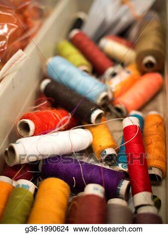 Picture - Box of thread reels in Jodhpur, Rajasthan, India.. Fotosearch