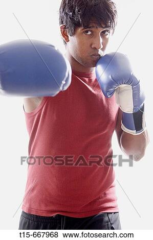 boxer throws a punch View Large Photo Image Stock Photo - boxer throws a punch. Fotosearch