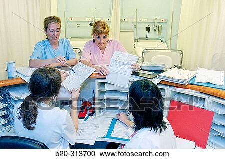 Stock Image - Boxes and control desk at hospital. Fotosearch